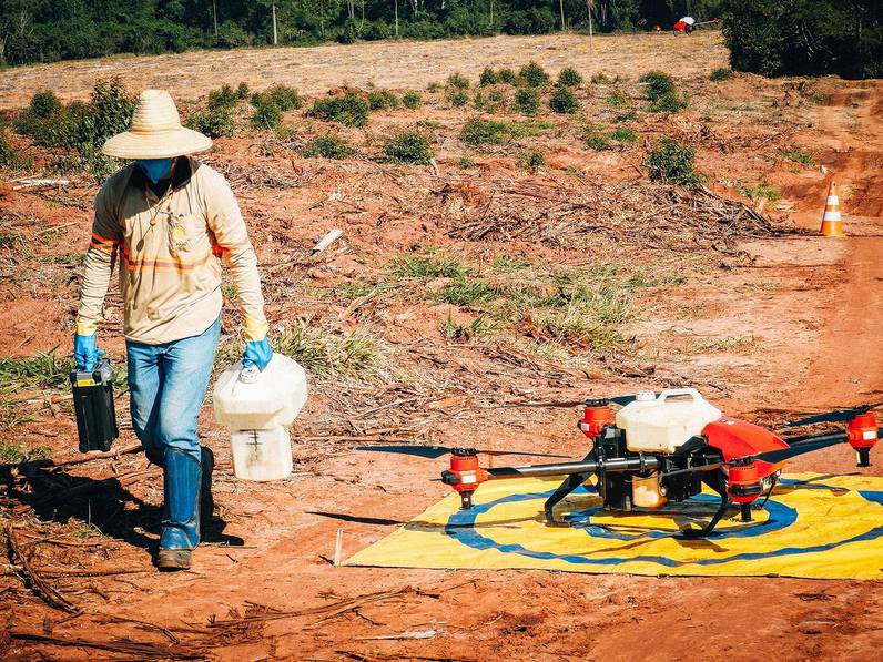  One single pilot controlling XAG drones for the forest protection mission