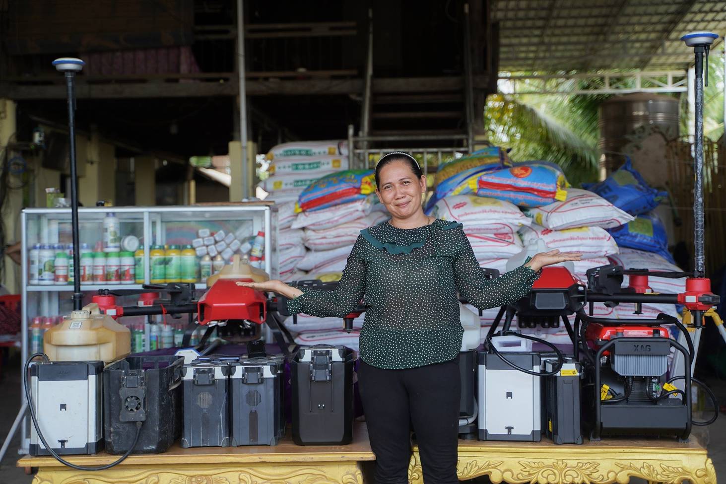 Tou Kousal showcases her XAG agricultural drones for daily use in farm work