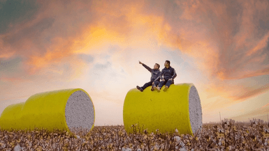 The two young managers in XAG Super Cotton Farm after annual bumper harvest